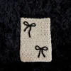 Funda para libro tejida a crochet blanco hueso y negro