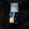 Funda para libro tejida a crochet con bolsillo azul con diseño de puntos
