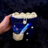 Funda para libro tejida a crochet con bolsillo azul con diseño de puntos