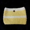Funda para libro tejida a crochet amarilla y blanca
