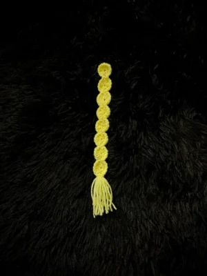 Marcapáginas redondo amarillo tejido a crochet